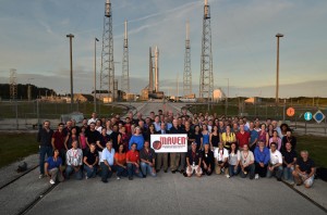 Members of the MAVEN team from across the world gathered in front of the spacecraft atop its Atlas V rocket on launchpad 41 the night before launch. (Courtesy Casey A. Cass/University of Colorado)