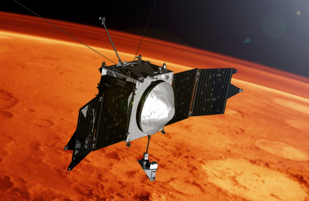 Artist's conception of the MAVEN spacecraft carrying out science operations at Mars.  MAVEN has been in science mode since mid-November 2014. (Courtesy NASA/GSFC)