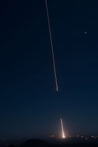 This time-lapse photo, taken from San Augustin Pass, captured the launch of the NASA Black Brant IX sounding rocket carrying the LASP-built CHESS experiment. (Courtesy Brandy Coons)