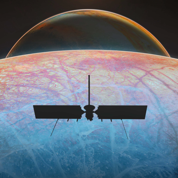Portion of the Europa Clipper poster showing the silhouetted spacecraft above Europa.