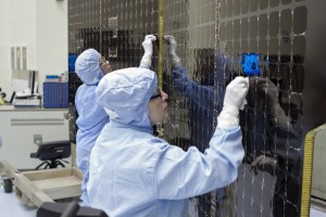 Inside Kennedy’s Payload Hazardous Servicing Facility technicians clean the electricity-producing solar arrays for the MAVEN spacecraft Aug. 28 (Courtesy NASA/Jim Grossmann)