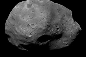 Orbiting a mere 3,700 miles (6,000 kilometers) above the surface of Mars, Phobos is closer to its planet than any other moon in the solar system. Visible on the small moon's unusually dark surface are many circular craters, long chains of craters, and strange streaks. MAVEN’s apoapsis (farthest point in its orbit) takes it out to a similar distance from Mars on each elliptical orbit. (Courtesy ESA/DLR/FU Berlin (G. Neukum))