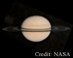 Pioneer image of Saturn taken in 1979 showing the satellite Rhea