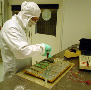 The detector panels of the SDC are being assembled in this image. (Courtesy LASP)