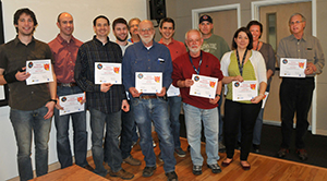 The LASP Mission Operations professional staff working on SORCE includes (left to right): Wayne Russell, Ken Griest, Darren Osborne, Sam Gagnard, Don Gritzmacher, Jack Faber, Gabe Bershenyi, Alain Jouchoux, Sean Ryan, Jenn Reiter, Deb McCabe, and Dave Welch. Not shown: Jerel Moffatt. The 18 LASP SORCE Mission Operations students who also received the Science Phoenix Award were not included in this photo.   Photo credit:  Mike Bryant, LASP.