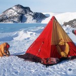 Researchers in a tent