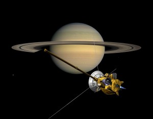 Saturn's shadow passes over its rings as the Cassini spacecraft looks on in this artist's concept. (Courtesy NASA/JPL-Caltech)