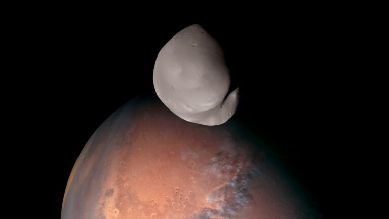 A striking view of Mars and its smallest moon, Deimos. This composite was created from several images taken by the EXI instrument aboard the Emirates Mars Mission when it traveled within about 100 km of Deimos. Credit: Emirates Mars Mission