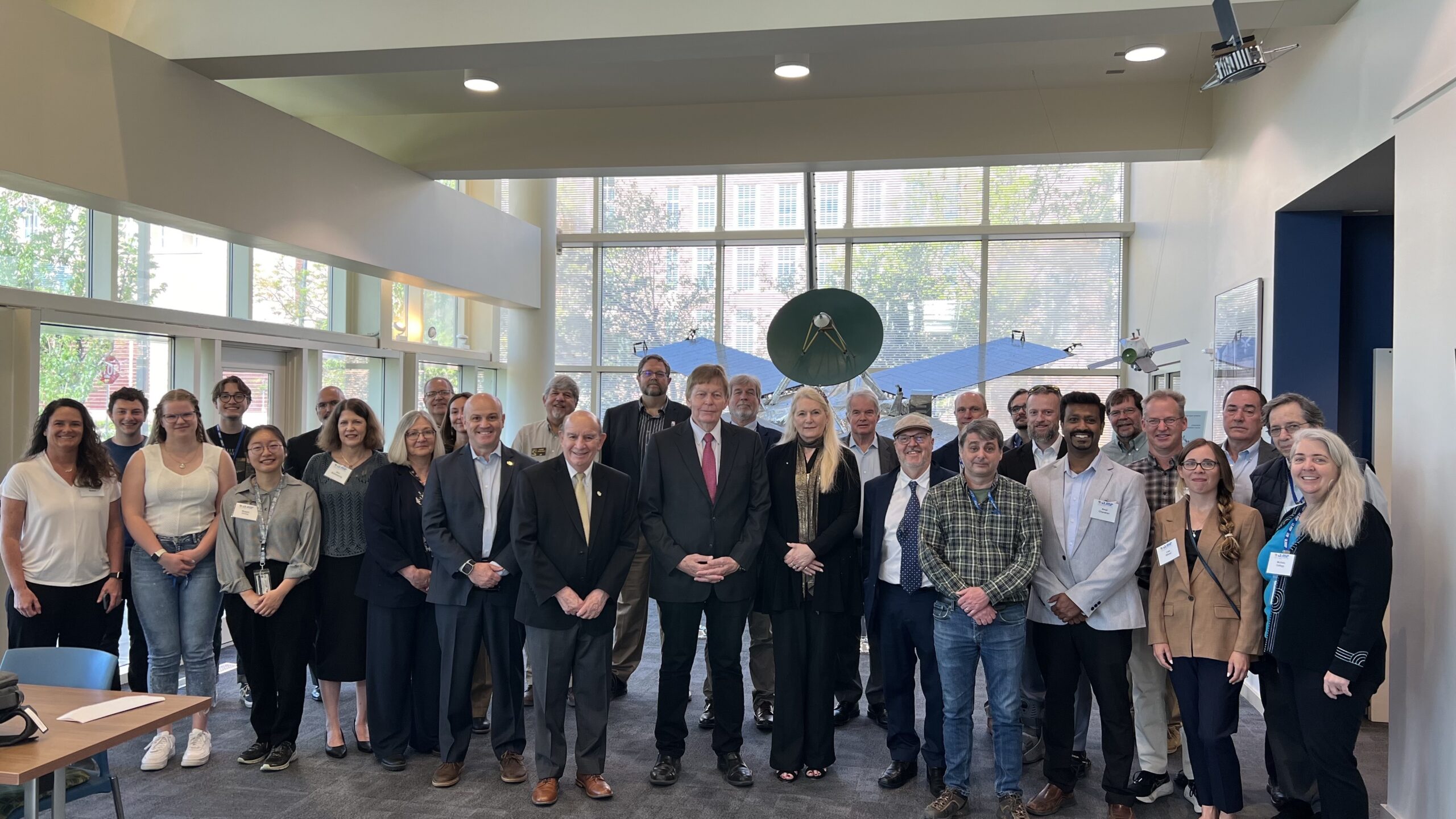 In May, leadership of the Committee on Space Research (COSPAR) attended a ceremony at the Laboratory for Atmospheric and Space Physics at the University of Colorado Boulder to designate the LASP CubeSat group as a COSPAR Center of Excellence for Capacity Building in CubeSat Technologies. Credit: LASP