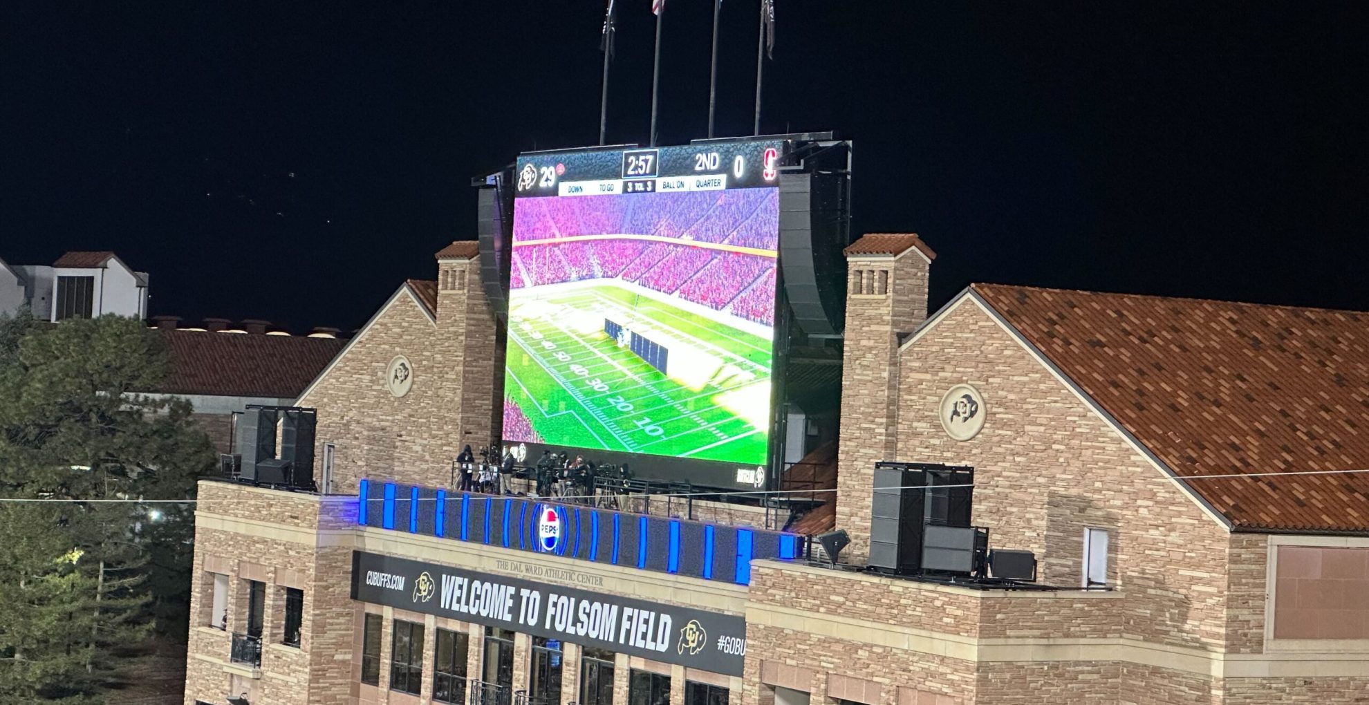 At the Oct. 13 CU Buffs space-themed football game, an illustration of the Europa Clipper spacecraft is displayed on the big screen showing that, when the spacecraft’s solar panels are deployed, it is about a third of the length of a football field. Credit: LASP
